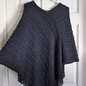 Black 3D felted texture knit poncho with fringe